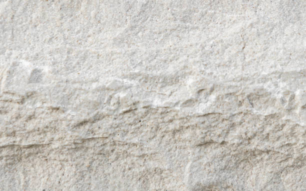 istock [4k] Close-up of White Crushed Stone Texture 2203883982