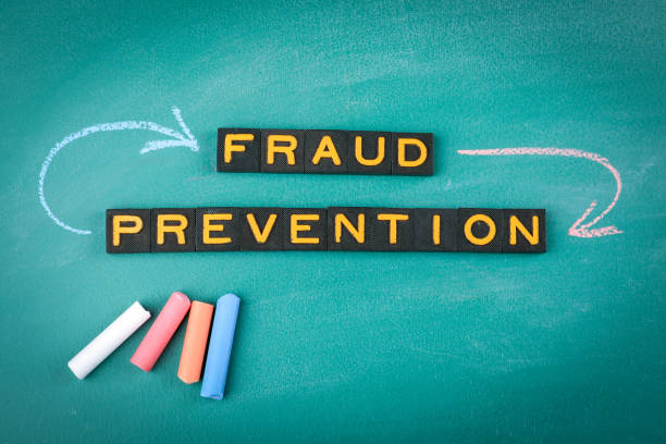 istock Fraud Prevention Concept with Chalkboard and Letter Tiles 2203886918
