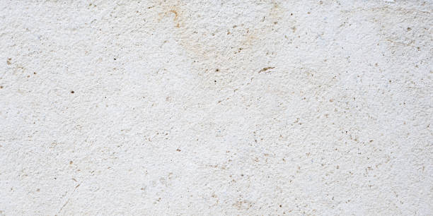 istock [5k] Close-up of White Natural Rust Stone Texture 2203888196