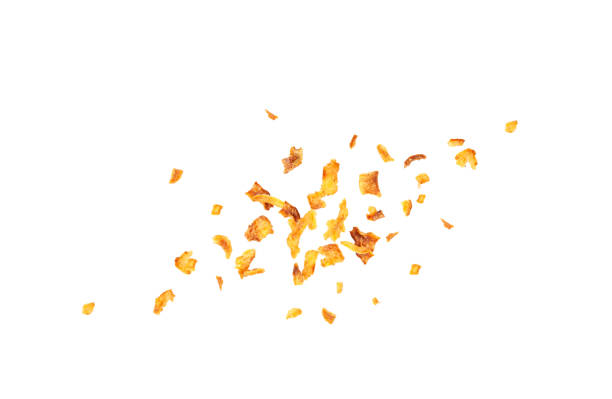 istock Falling Roasted Onion Isolated, Flying Dry Onion Pieces, Bulb Chips, Deep Fried Vegetable 2203891035