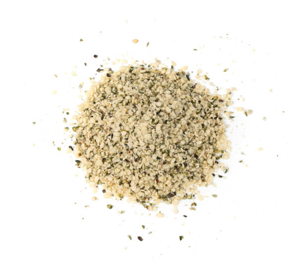 istock Shelled hemp seeds pile isolated, peeled cannabis grains, marijuana kernels without peel 2203891093