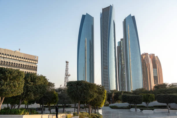 Abu Dhabi, UAE, January 28, 2025: Etihad Towers in Abu Dhabi, a modern glass skyscraper complex reflecting the skyline and urban landscape, editorial image