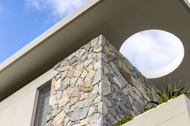 Closeup top part of modern house, background with copy space, full frame horizontal composition