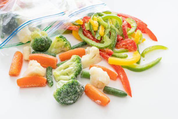 istock Frozen vegetables in freezer bags. Freezing vegetables. 2203898432