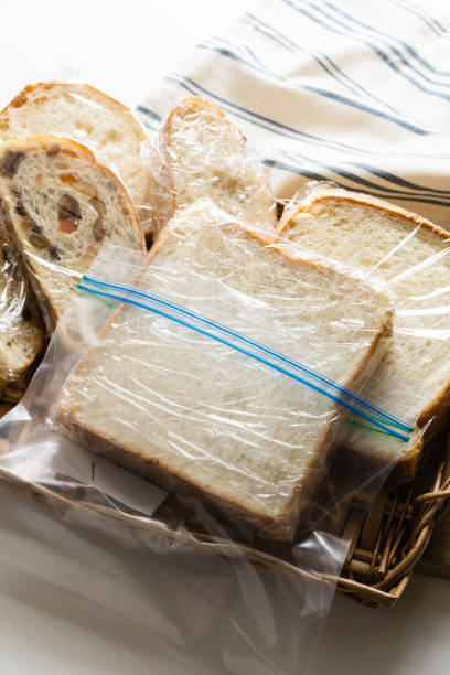 istock Bread wrapped in plastic wrap. How to store bread. 2203898494