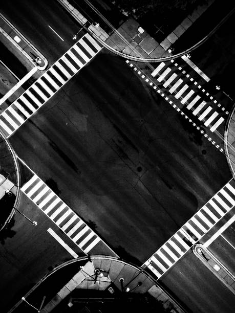 istock Black and white crosswalk from above 2203902958