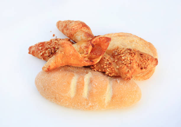 Pile of bread and bun isolated on a white background.