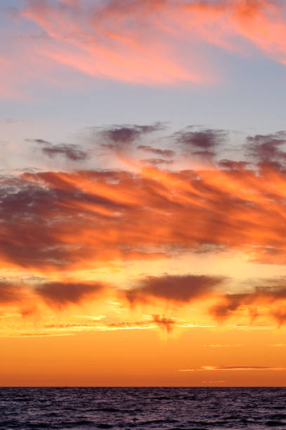 istock Sunset and Sea - Color Portrait Format 2203912206