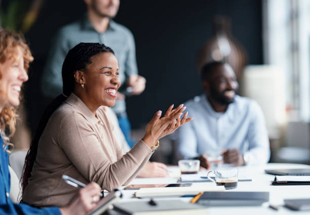 istock Diverse Team Engaged in a Business Meeting in a Modern Office Space 2203913898