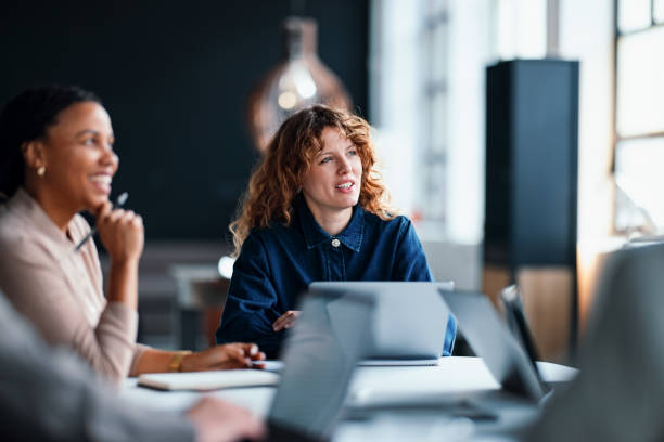 istock Team Members Engaged in a Collaborative Business Meeting at an Office Workspace 2203913985