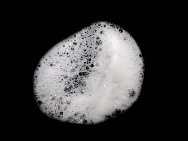 istock bubbles isolated on black with texture and contrast background. 2203914227