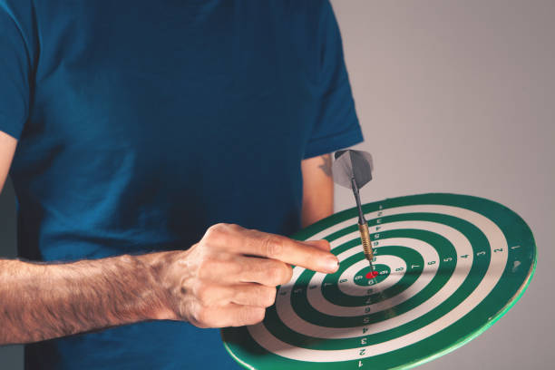 close - up of man  with a darts.