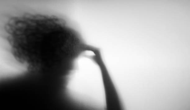 istock Shadow of a Mental Health Disorder. Weak and Depressed Mind, Stressed,Anxiety, Negative Feeling. Hand on Forehead with Messy hair 2203916246