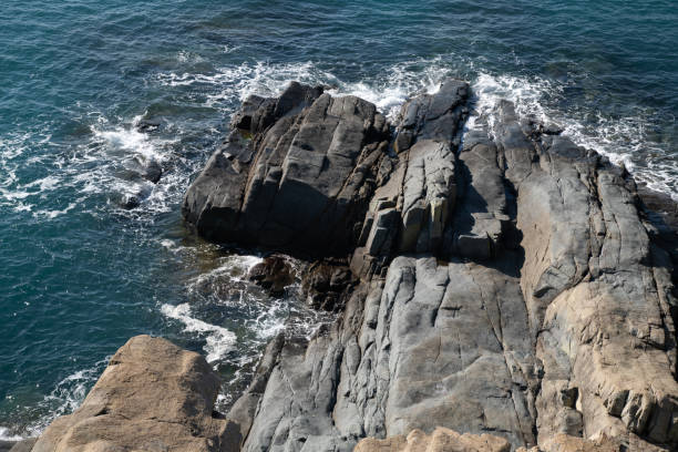 istock sea with cliffs and rocks on a sunny day 2203919878