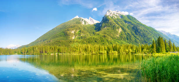 Hintersee Lake (Ramsauer Ache) below the steep walls of the Reiteralm and Hochkalter are among the most picturesque place in the Bavarian Alps, Germany
