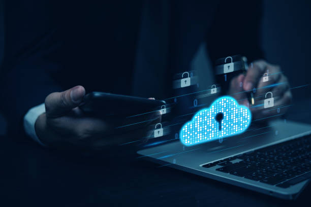 istock Cybersecurity concept with a businessman using a smartphone and cloud security icons, representing data protection and encryption. 2203933164