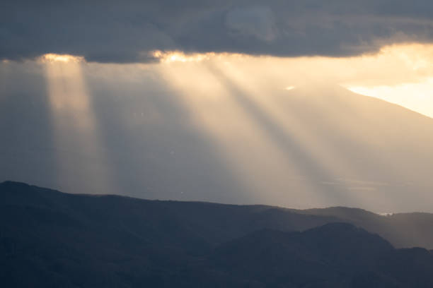 Beautiful light shining through the cloudy sky