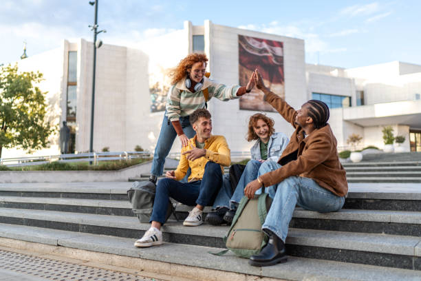 istock Multiracial university students hang out in campus 2203935304