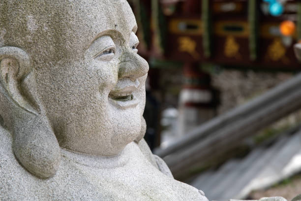 istock Monk statue in the Buddhist temple 2203939413
