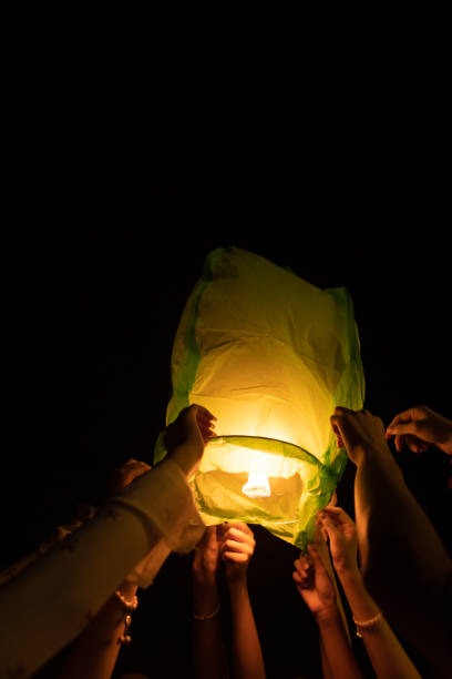 istock Chinese Kongming lanterns pray for blessings, crowds gather together 2203939497