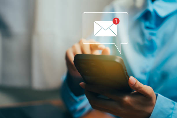 istock Person Using Smartphone with Notification of New Email Message on Screen, Business concept 2203942666