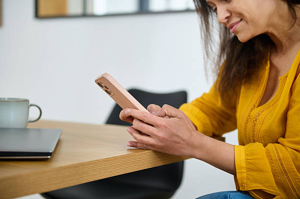 istock Successful Businesswoman Working Remotely in a Cozy Home Office Setting 2203942844