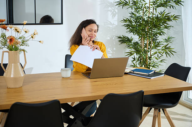 istock Confident Businesswoman Working Remotely in Elegant Home Office Setup 2203942848