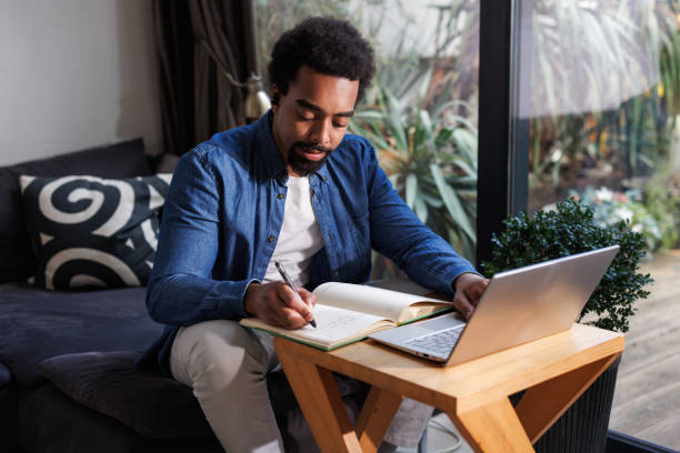 istock African American man working in a cozy home setting 2203943024