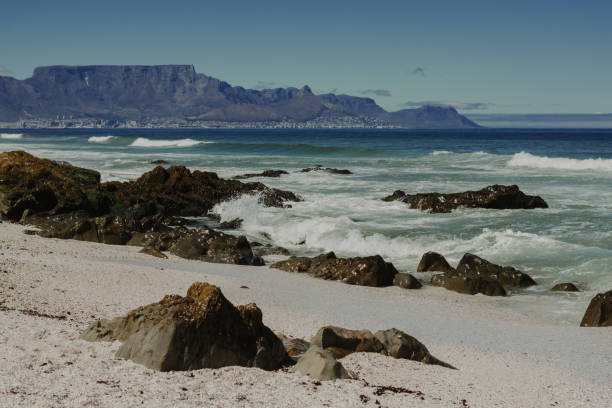 istock Scenic beach view with Table Mountain in background 2203944744