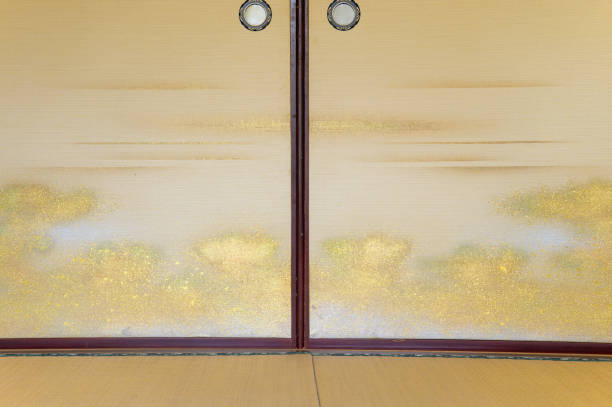 istock Gold leaf sliding doors 2203946347
