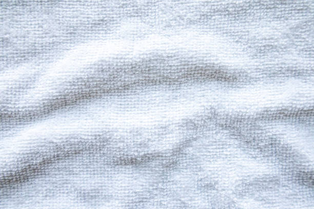 istock Close-up view of clean white towel. 2203950344