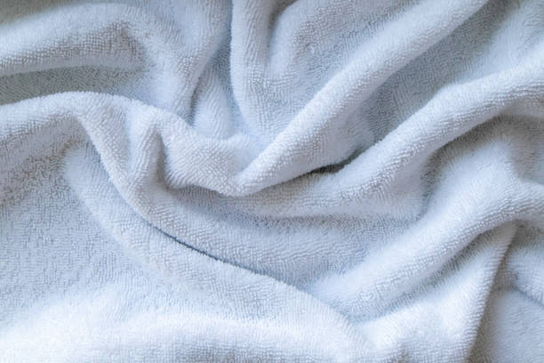 istock Close-up view of clean white towel. 2203950361