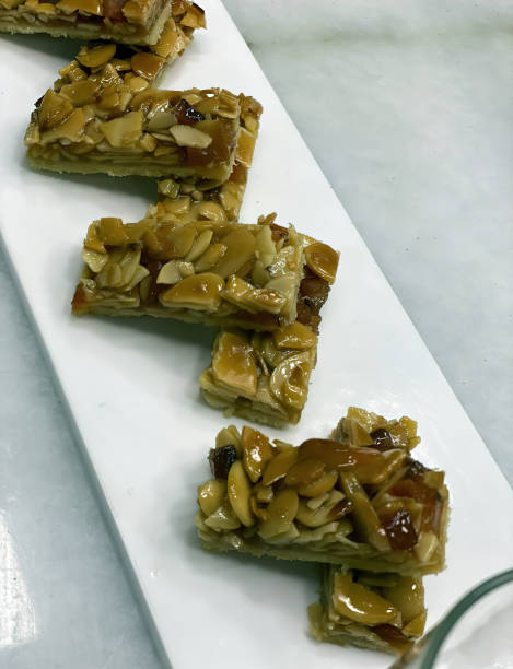 istock Almond Brittle Dessert on White Plate 2203951205