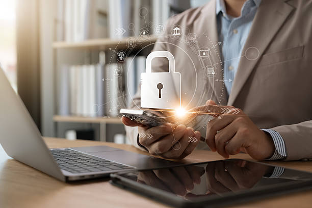 istock Cyber ​​Security Protecting sensitive business information, Businessman using laptops and tablets Smart security software, Protecting financial data, Global network protection. 2203951551