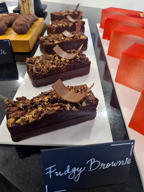 A variety of delectable bakery items are arranged attractively, highlighting the rich textures and colors of each treat