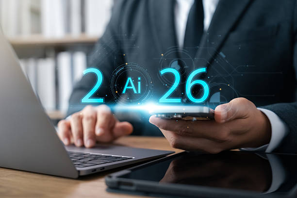 istock AI-driven business transformation in 2026, businessman using laptop and tablet to develop strategic business using artificial intelligence AI predicts the future and analyzes global economic data. 2203953728