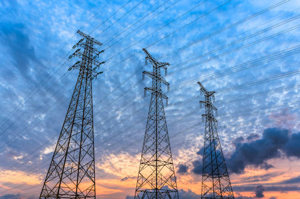 istock High voltage power lines against a dramatic sky at sunset 2203957462