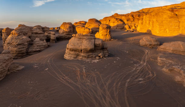 istock Spectacular desert landscape with unique rock formations at sunset 2203968062