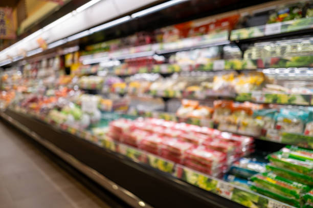 istock Everyday Scenery - Supermarket Shelves Captured in Soft Focus 2203972893