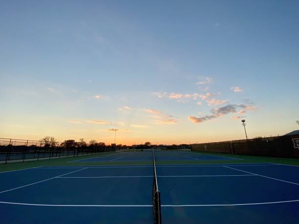 istock Tennis Court View at Sunset Glow 2203977424