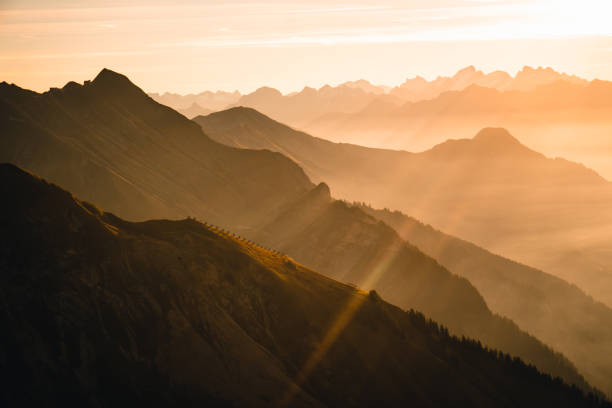 istock Aerial view of mountain ranges at sunrise 2203978521