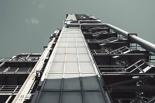 Low angle view of office buildings under clear sky