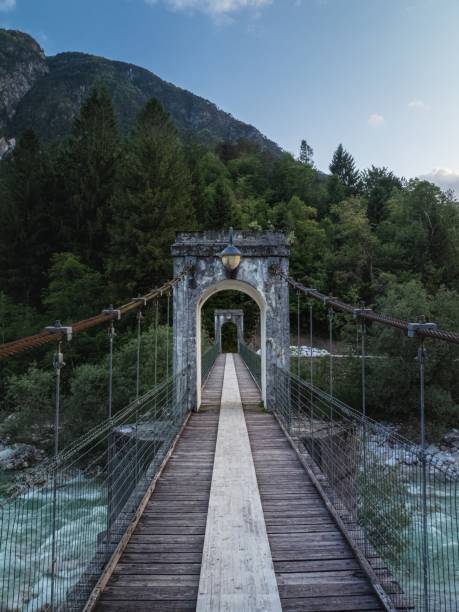 istock A bridge over a river with a mountain in the background 2203985772