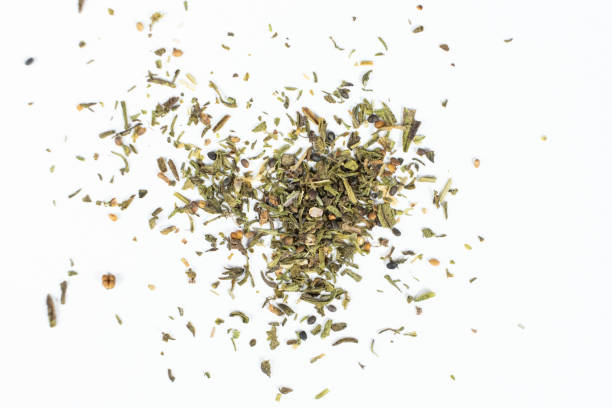 istock Culinary savory dried herb seasoning on white background top view. 2203987311