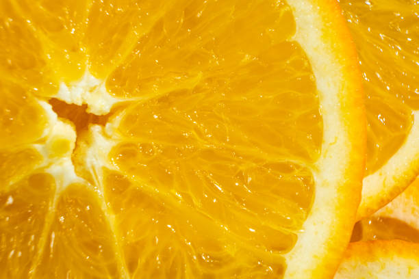 istock Macro Texture Of Ripe Fresh Orange Fruit Pulp. 2203987404