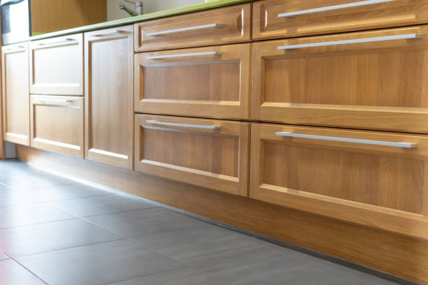 istock Italian design kitchen with oak wood cabinets with silver handles and green countertop. 2203987607