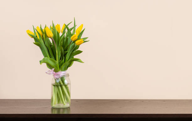 Bouquet of yellow tulips in the studio