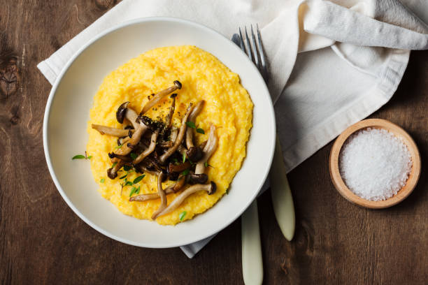 istock Creamy polenta with roasted shimeji mushrooms. 2203992219