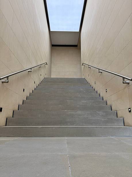 istock Minimalist staircase leading up to a skylight 2203993469