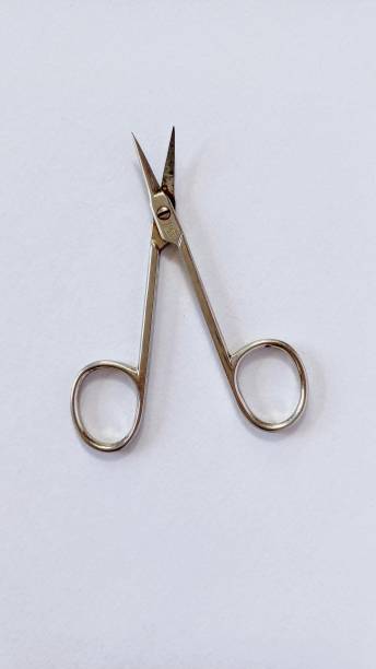 istock One pair of scissors on a white background. 2203994999